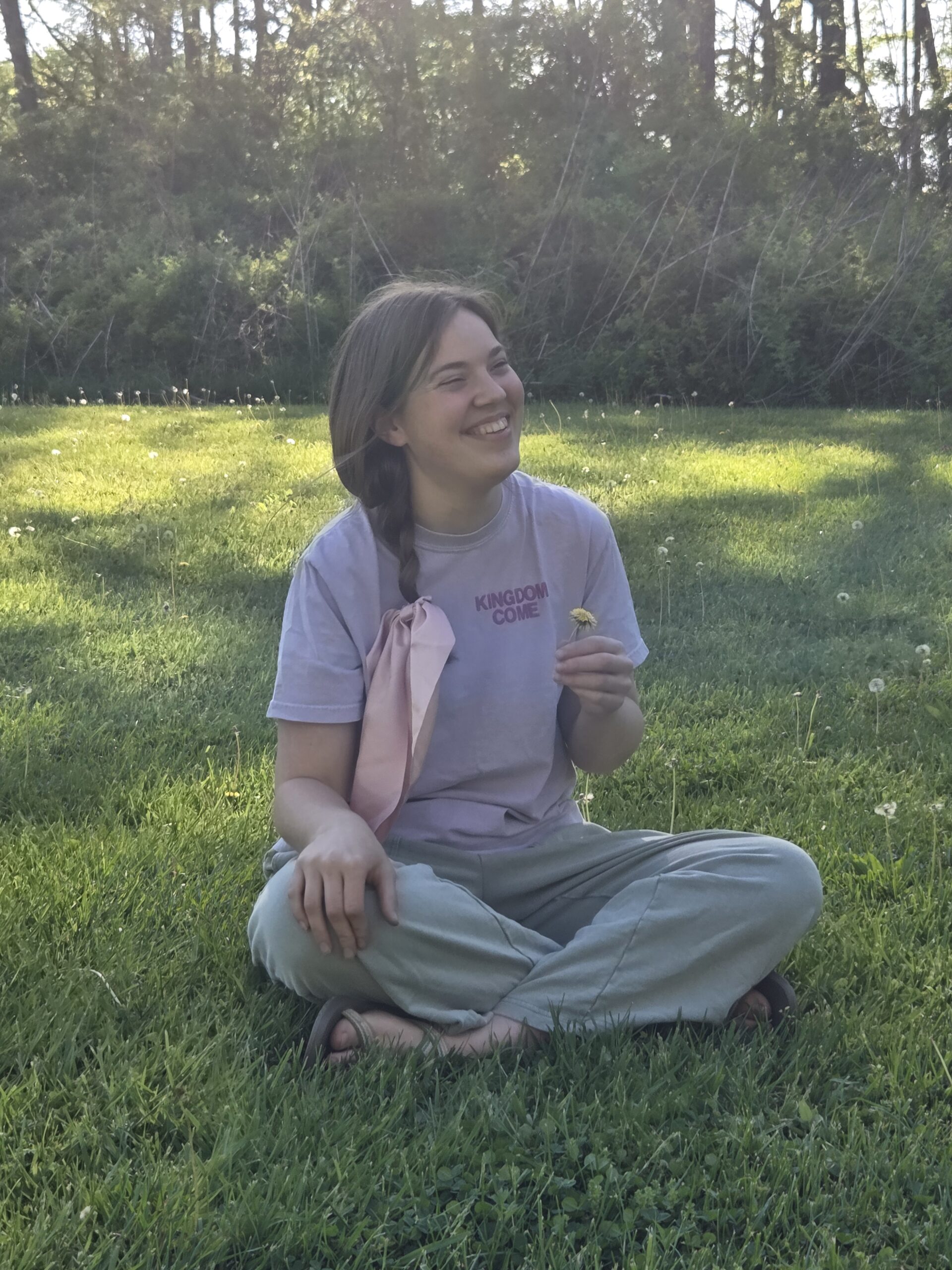 woman sitting in a meadow