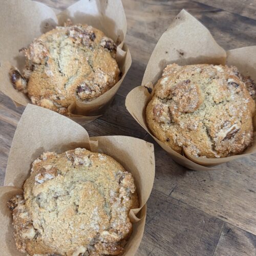 three muffins on a counter