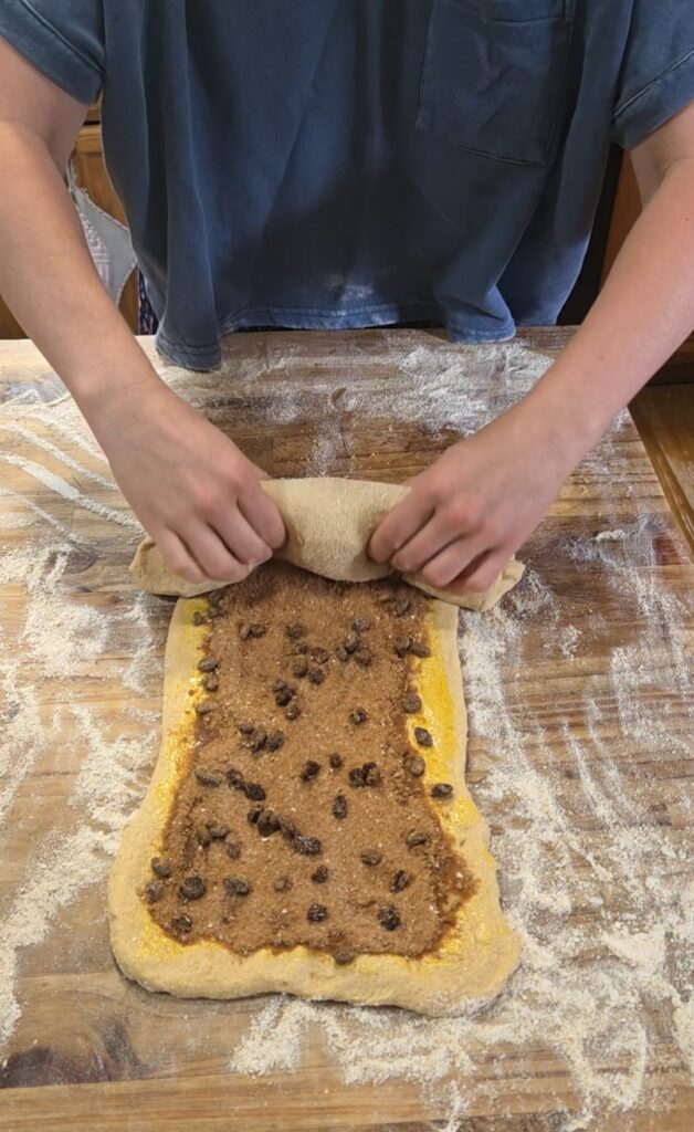 rolling up bread dough