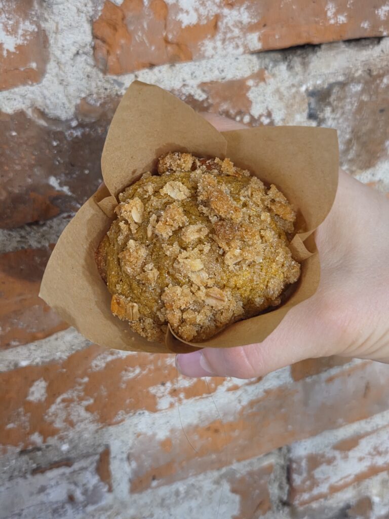 holding a muffin